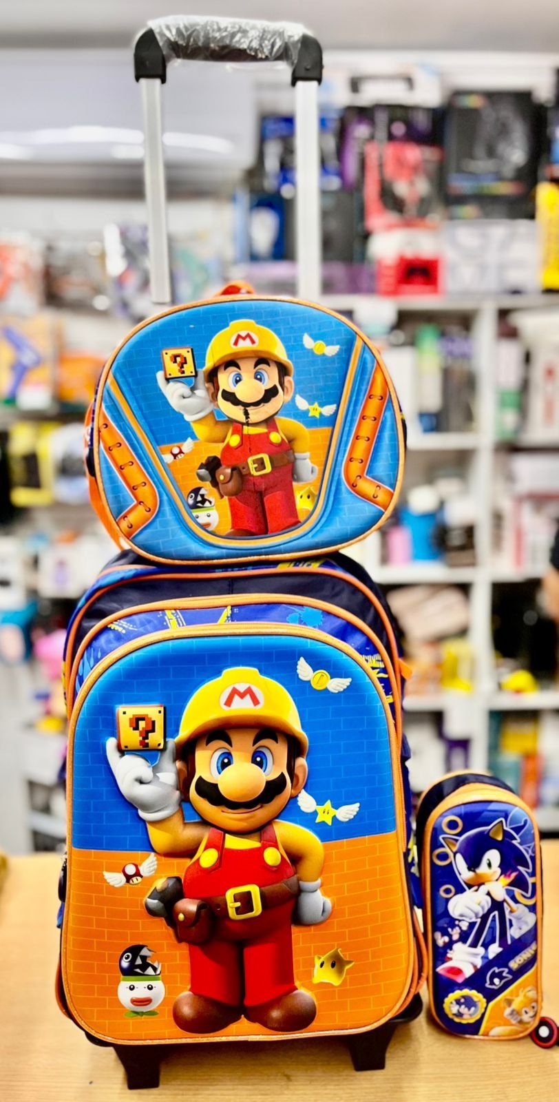 Set x 3 *MARIO BROSS* Mochila Con Carro + Lonchera Termica + Cartuchera (De Sonic) -Ruedas con Luces- Escolar 3D